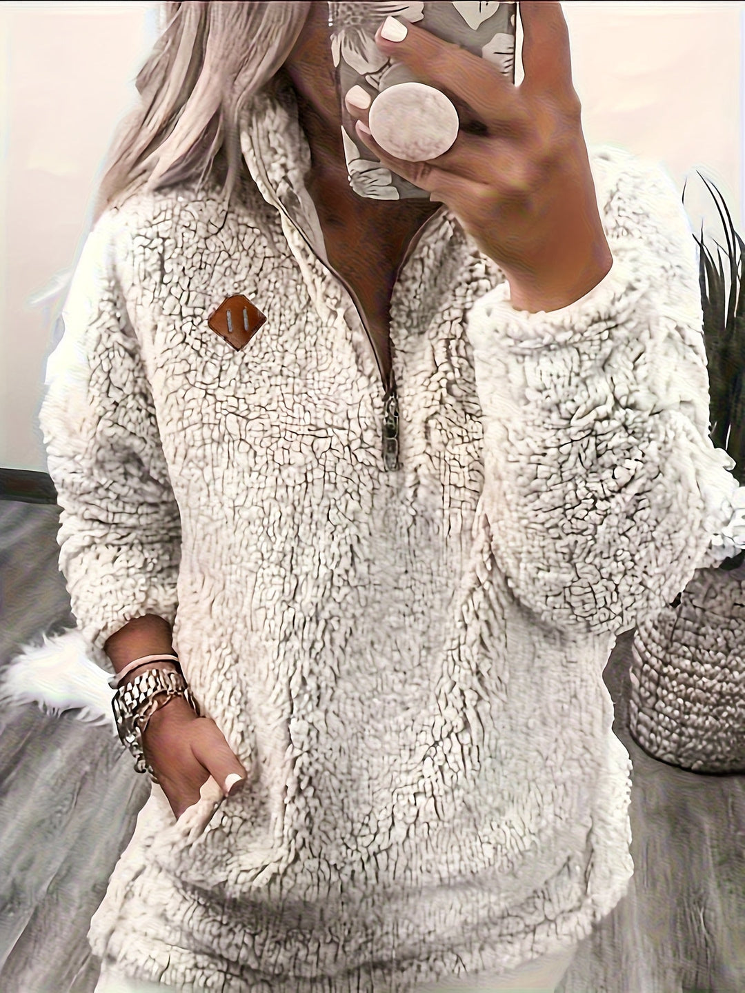 Tiare | Pullover peludo con media cremallera