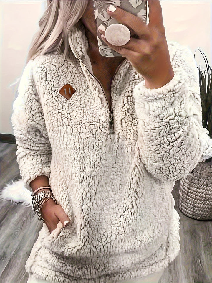 Tiare | Pullover peludo con media cremallera