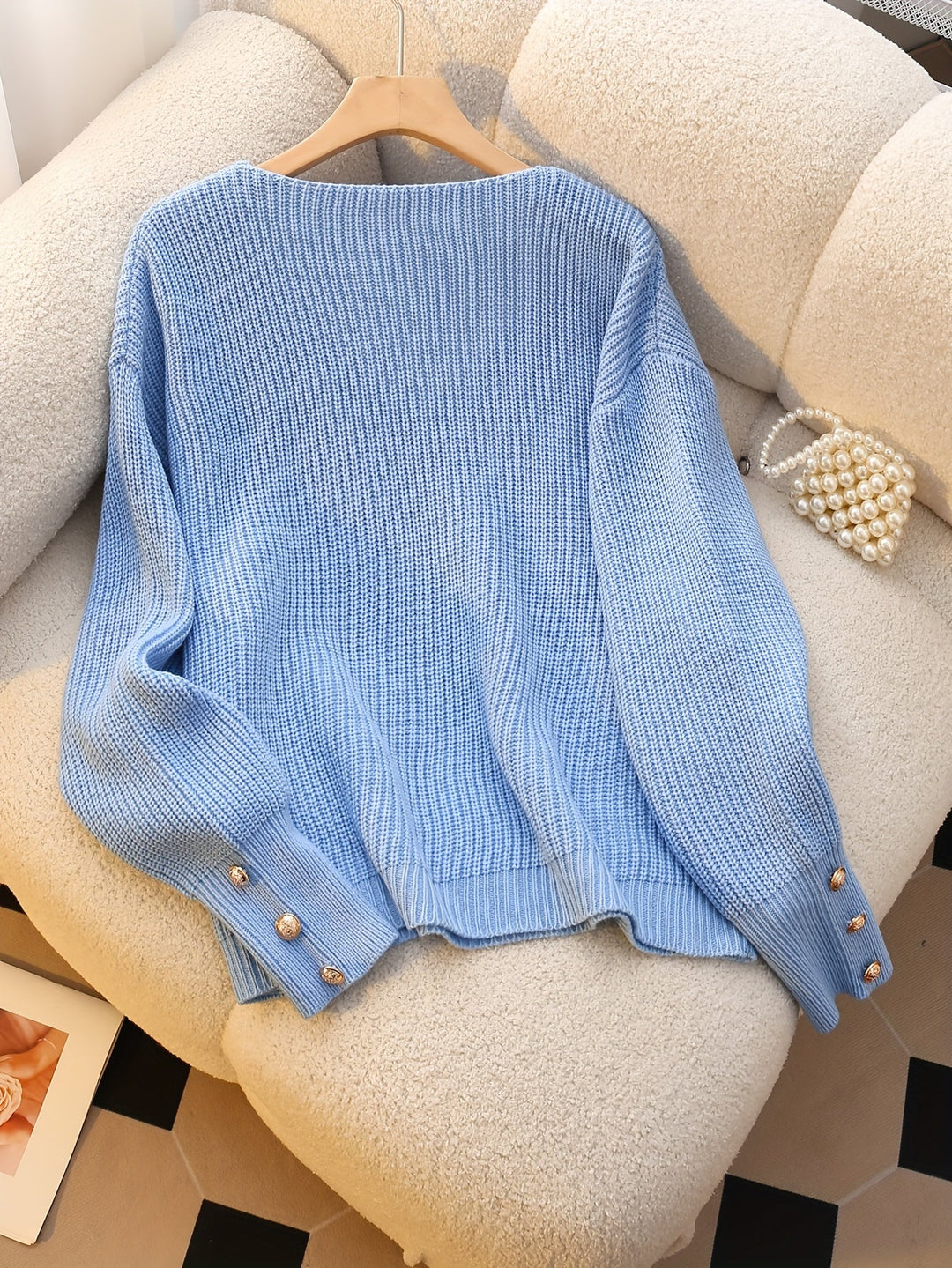 Nubia Rosa | Sweater de punto acanalado con escote V