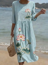 Nilda | Vestido midi floral cuello redondo