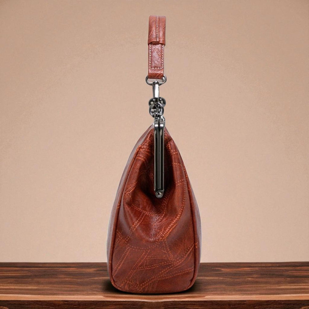 Delfina | Cartera vintage con cierre de beso