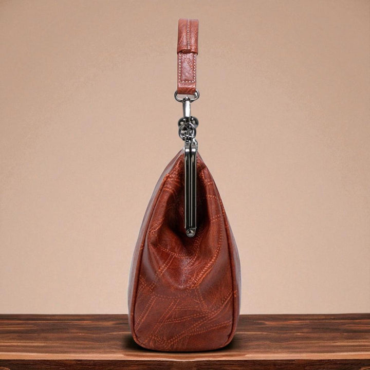 Delfina | Cartera vintage con cierre de beso