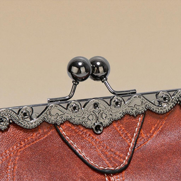 Delfina | Cartera vintage con cierre de beso