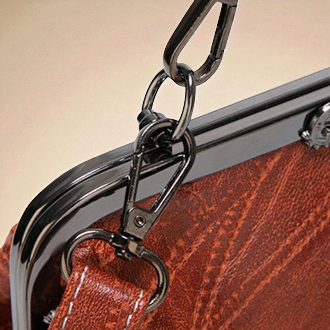 Delfina | Cartera vintage con cierre de beso