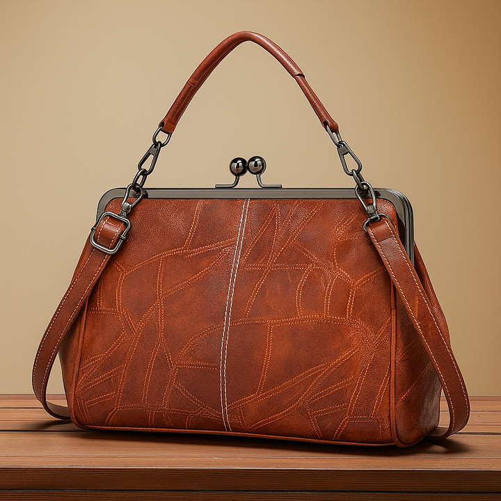 Delfina | Cartera vintage con cierre de beso