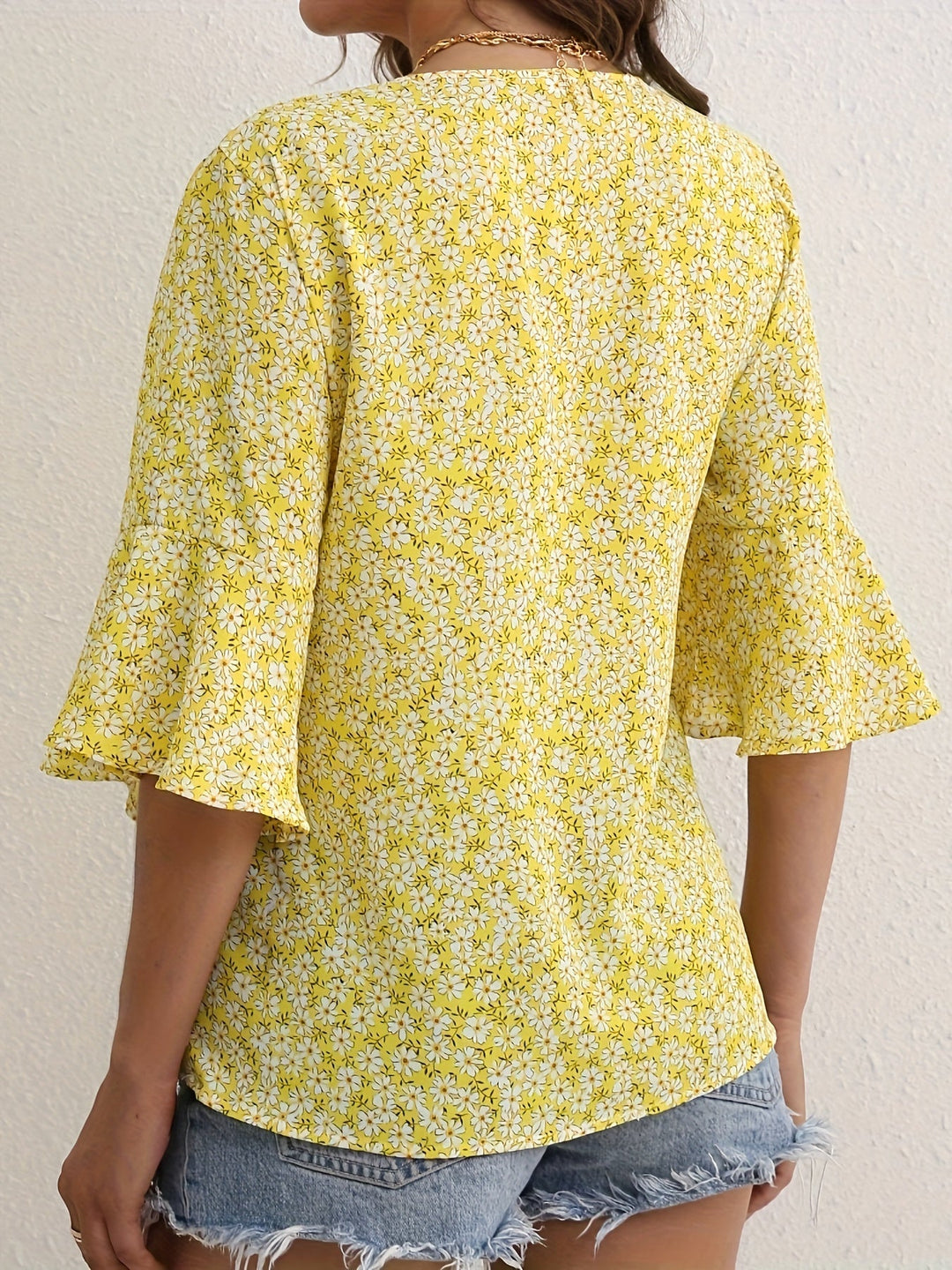 Sheila | Blusa floral con mangas volantadas