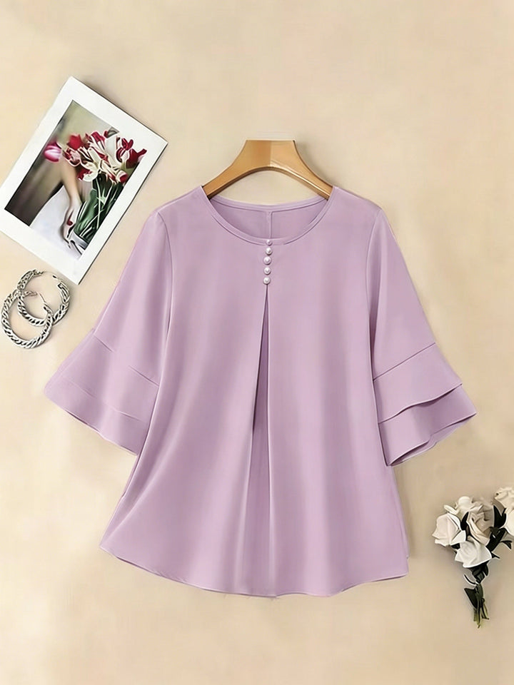 Naomi | Blusa plisada de mangas acampanadas