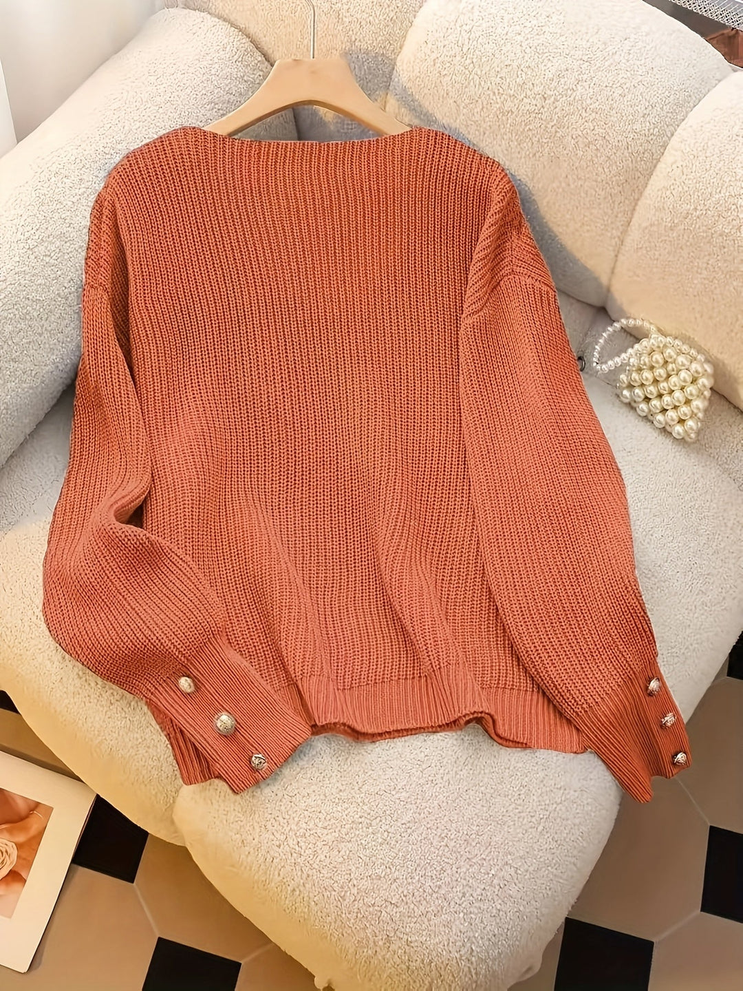 Nubia Rosa | Sweater de punto acanalado con escote V