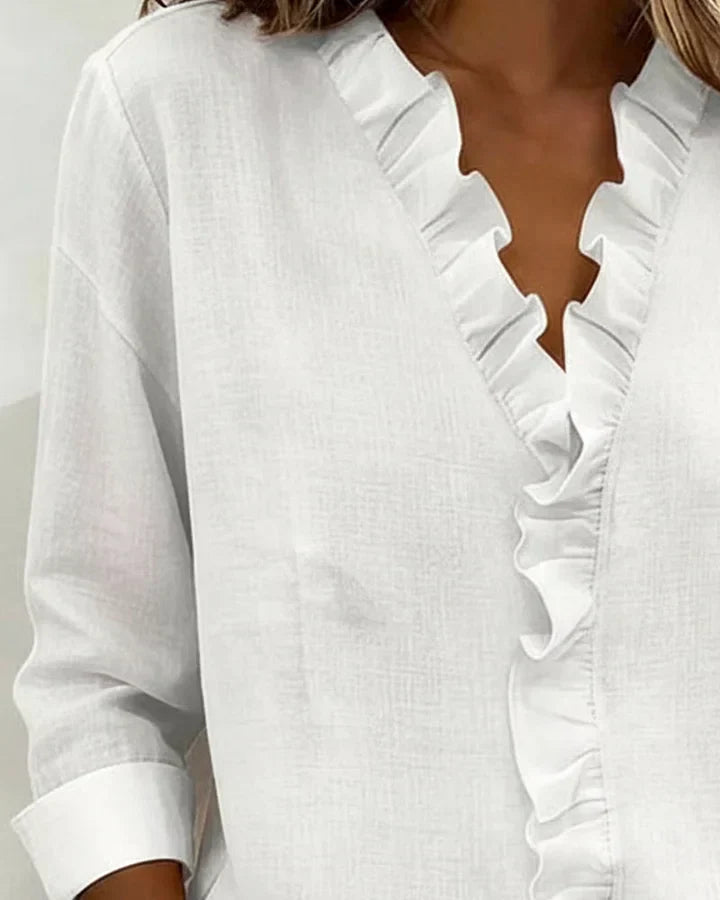 Fabiola | Blusa manga larga con escote en V y volantes