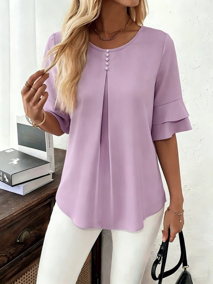 Naomi | Blusa plisada de mangas acampanadas