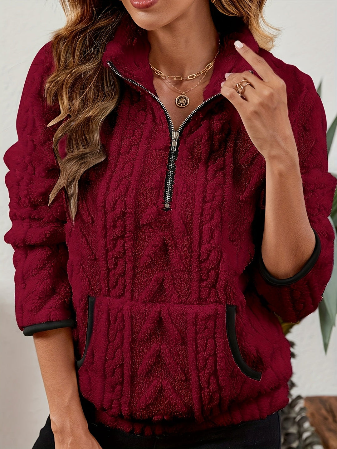 Manuela | Pullover texturado con media cremallera