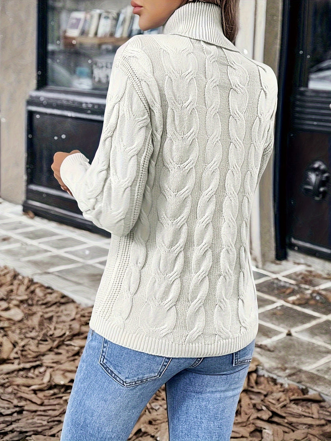 Sarai | Sweater de punto trenzado cuello alto