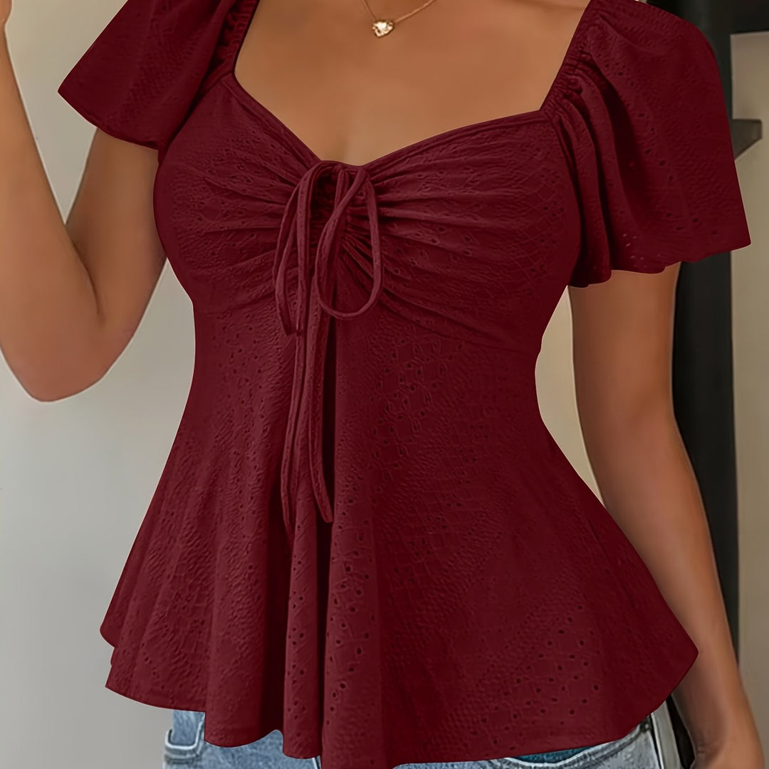 María Ángela | Top peplum de manga corta abullonada