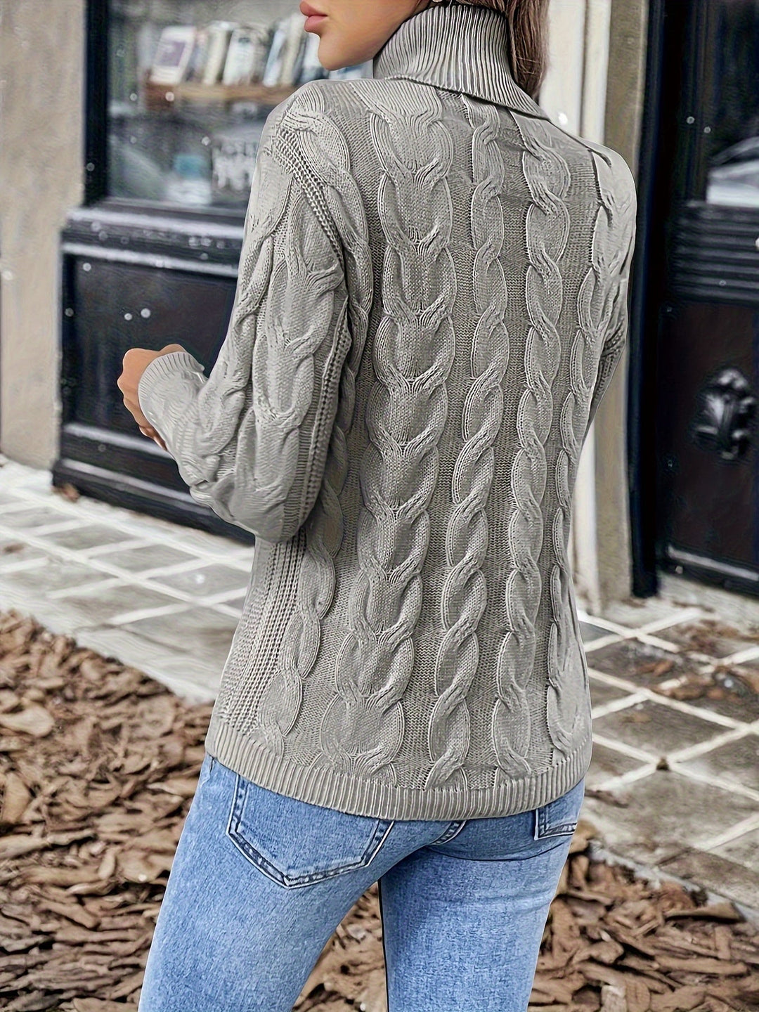 Sarai | Sweater de punto trenzado cuello alto
