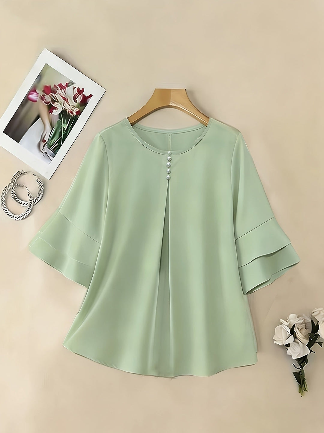 Naomi | Blusa plisada de mangas acampanadas