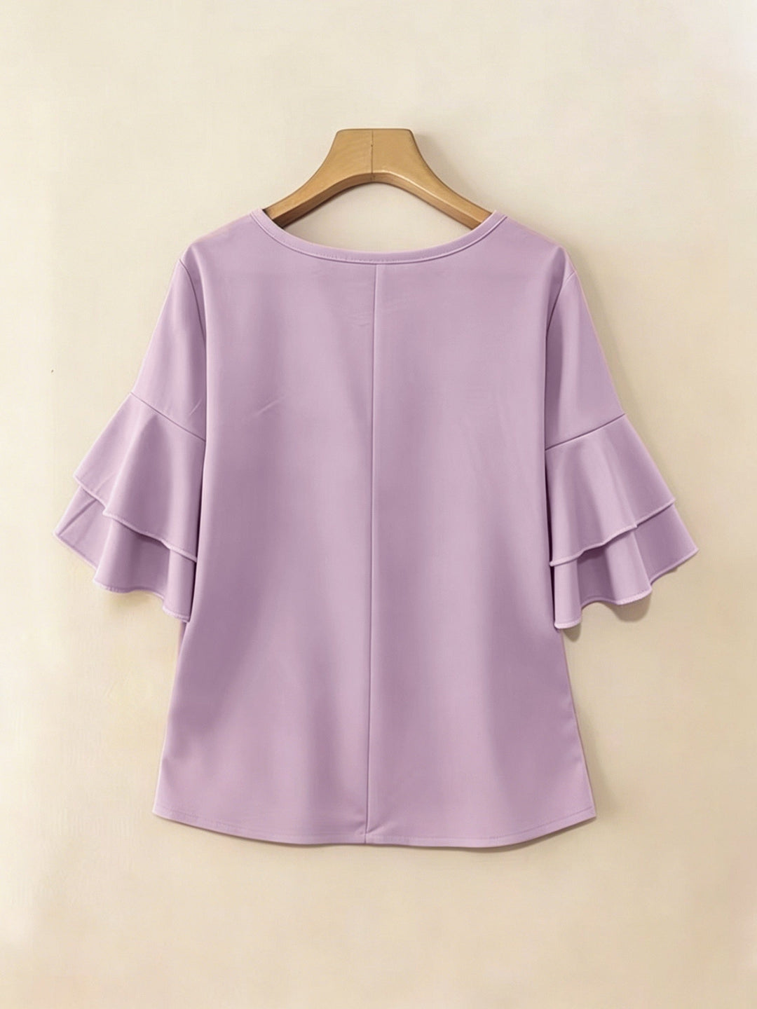 Naomi | Blusa plisada de mangas acampanadas