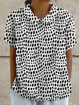 María Florencia | Blusa de lunares manga corta