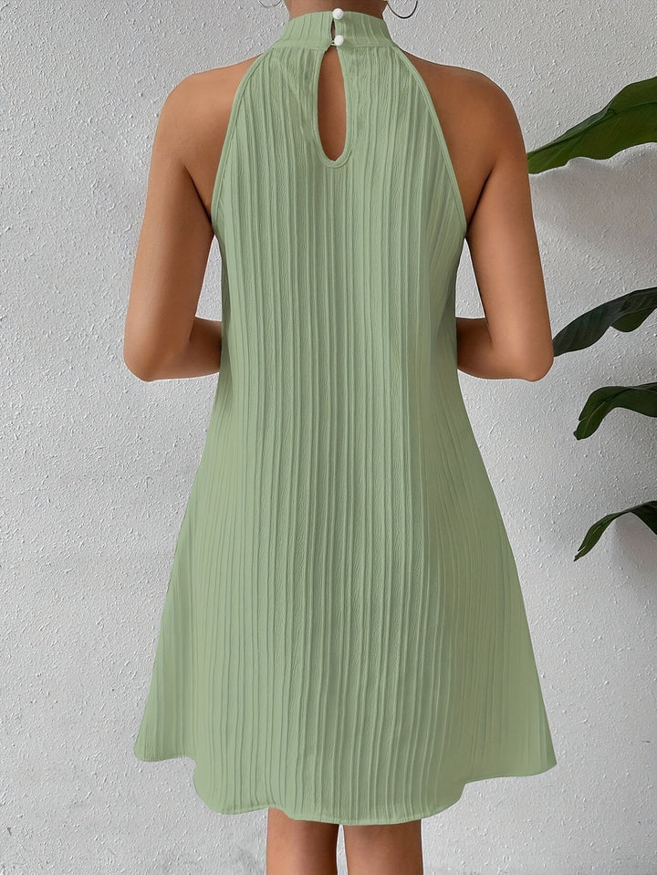 Matilde | Vestido corto texturizado cuello halter