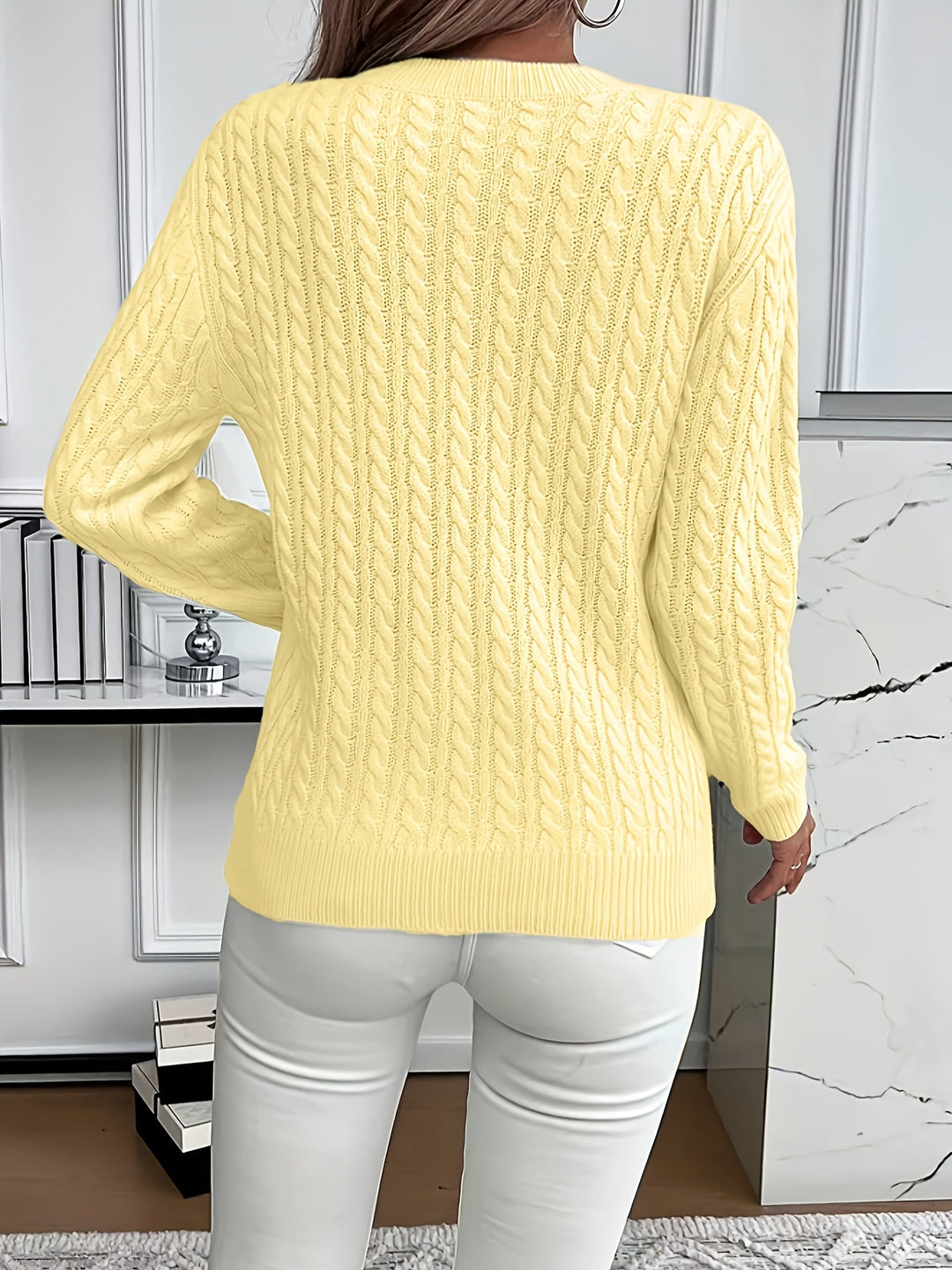 Saskia | Sweater de punto trenzado cuello redondo