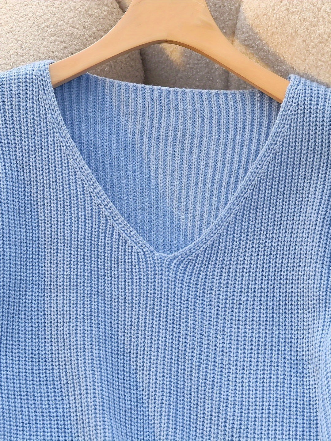 Nubia Rosa | Sweater de punto acanalado con escote V