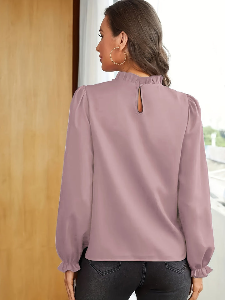 Melanie | Blusa de cuello alto con volantes y mangas abullonadas