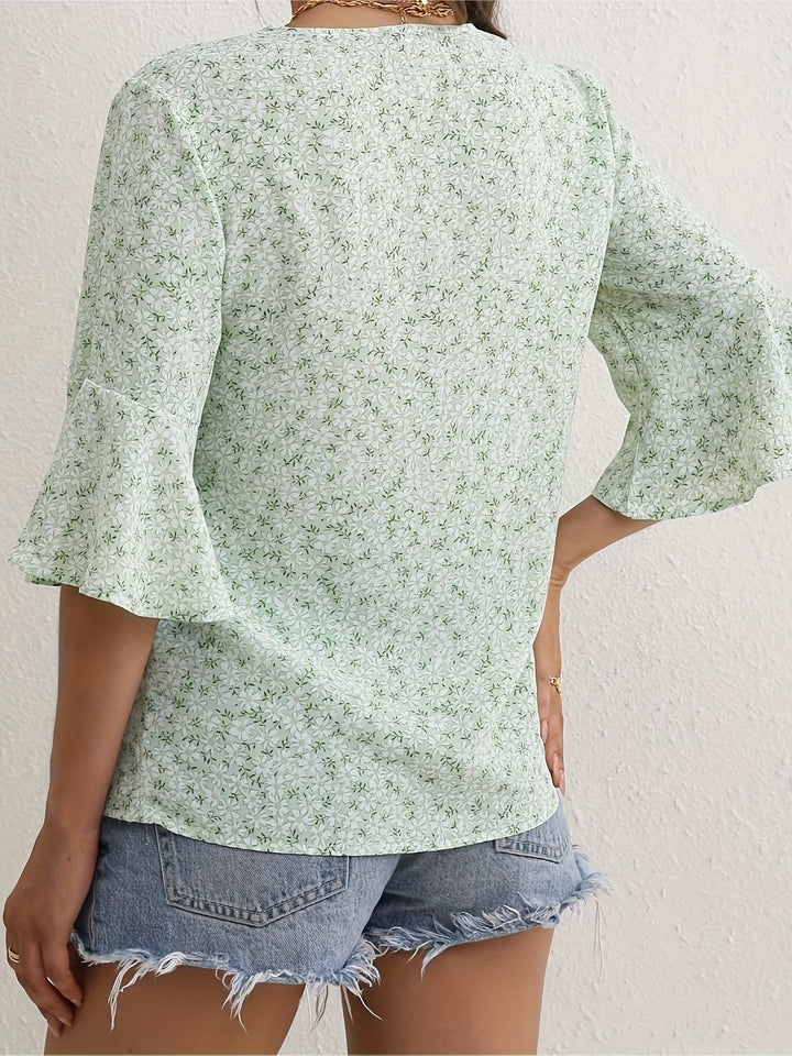 Sheila | Blusa floral con mangas volantadas
