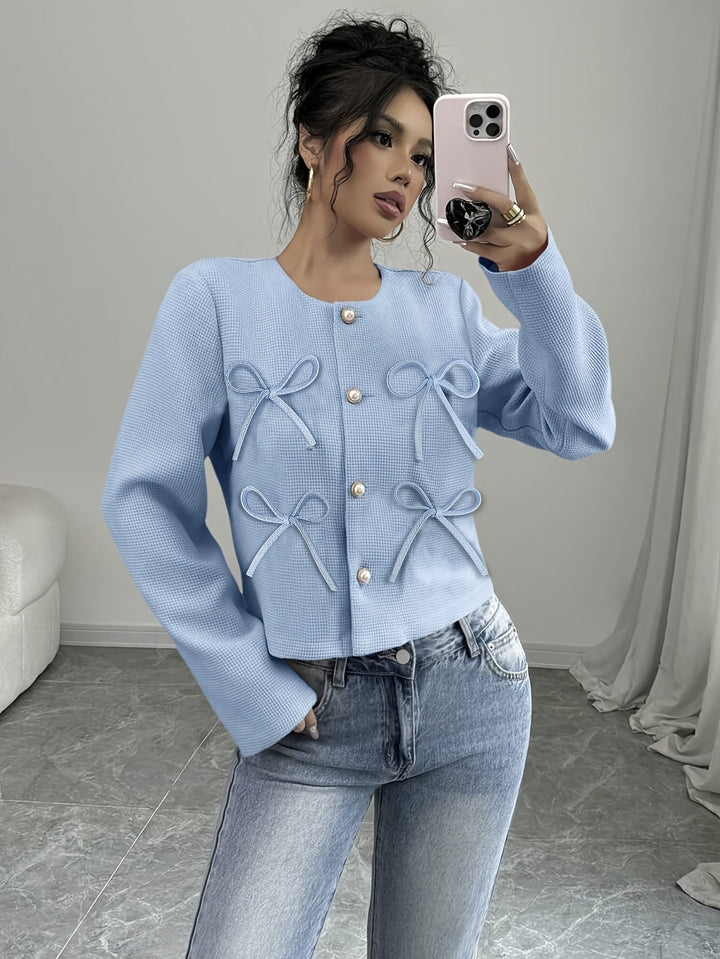 Isabella | Chaqueta corta con moños