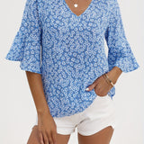 Sheila | Blusa floral con mangas volantadas