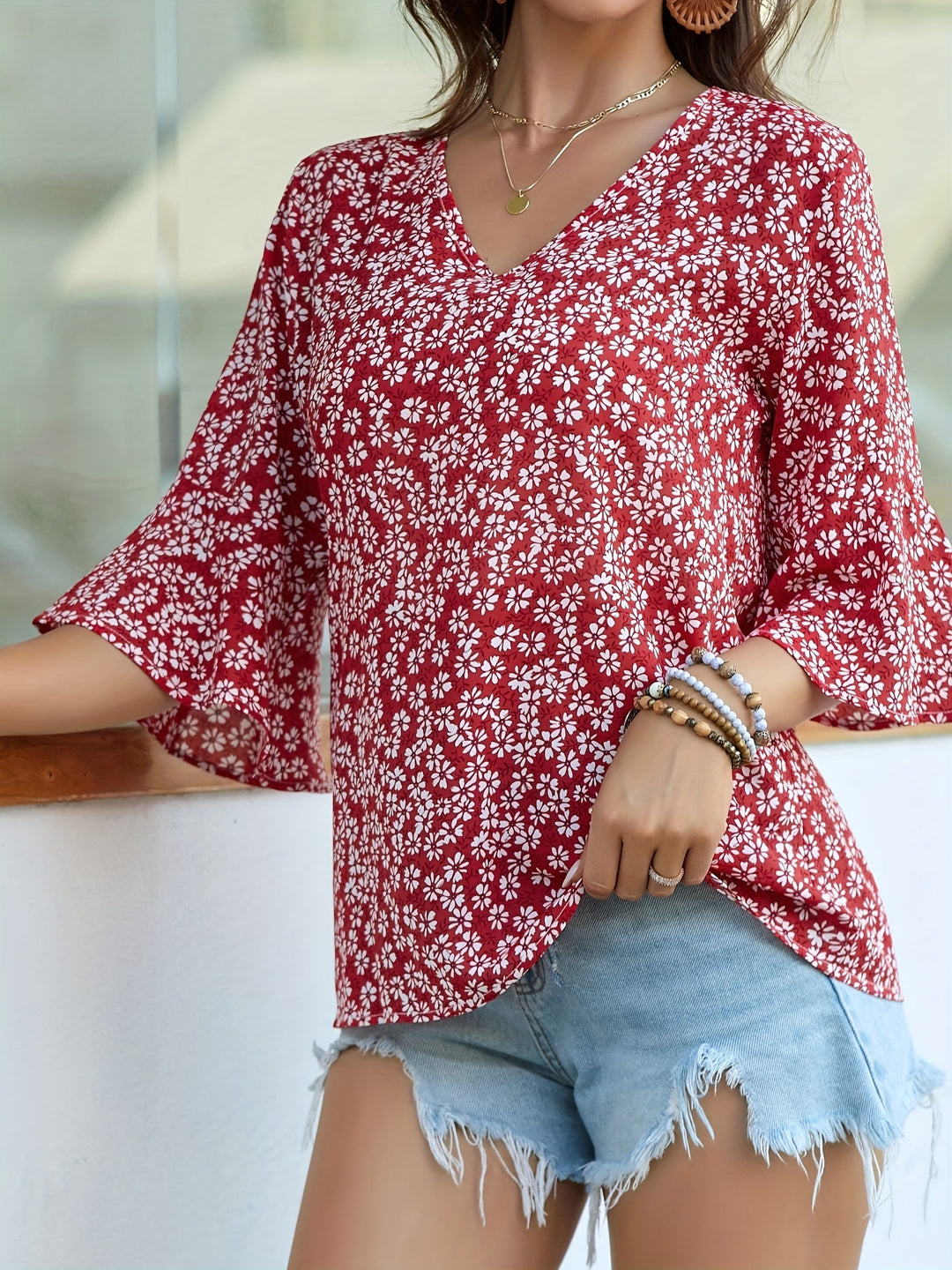 Sheila | Blusa floral con mangas volantadas