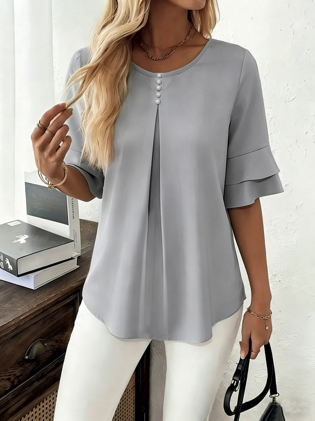 Naomi | Blusa plisada de mangas acampanadas