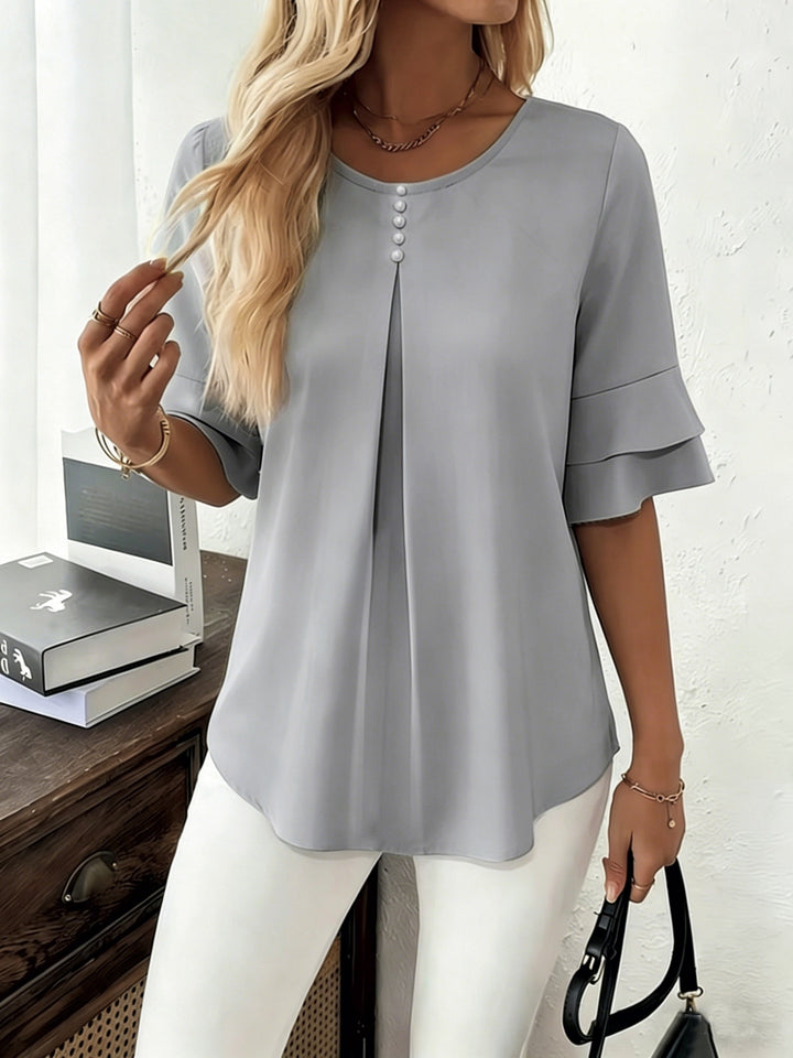 Naomi | Blusa plisada de mangas acampanadas