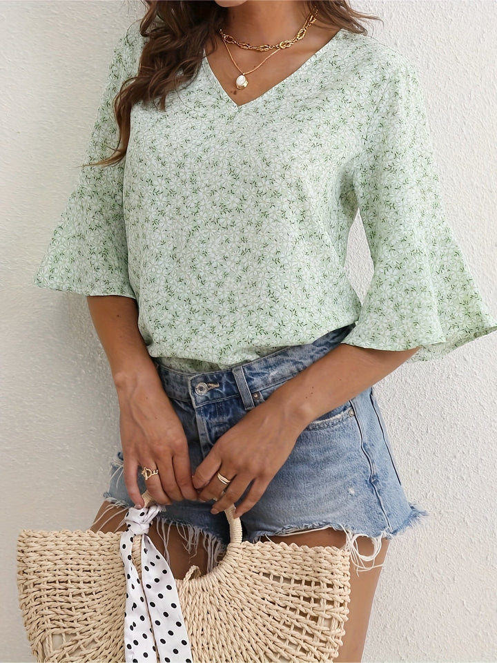 Sheila | Blusa floral con mangas volantadas