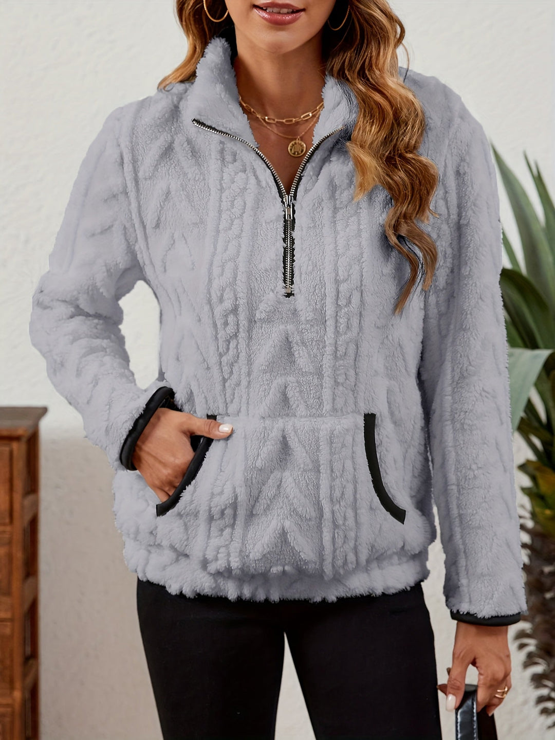 Manuela | Pullover texturado con media cremallera