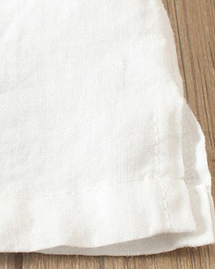 Paulette | Blusa de verano con botones asimétricos