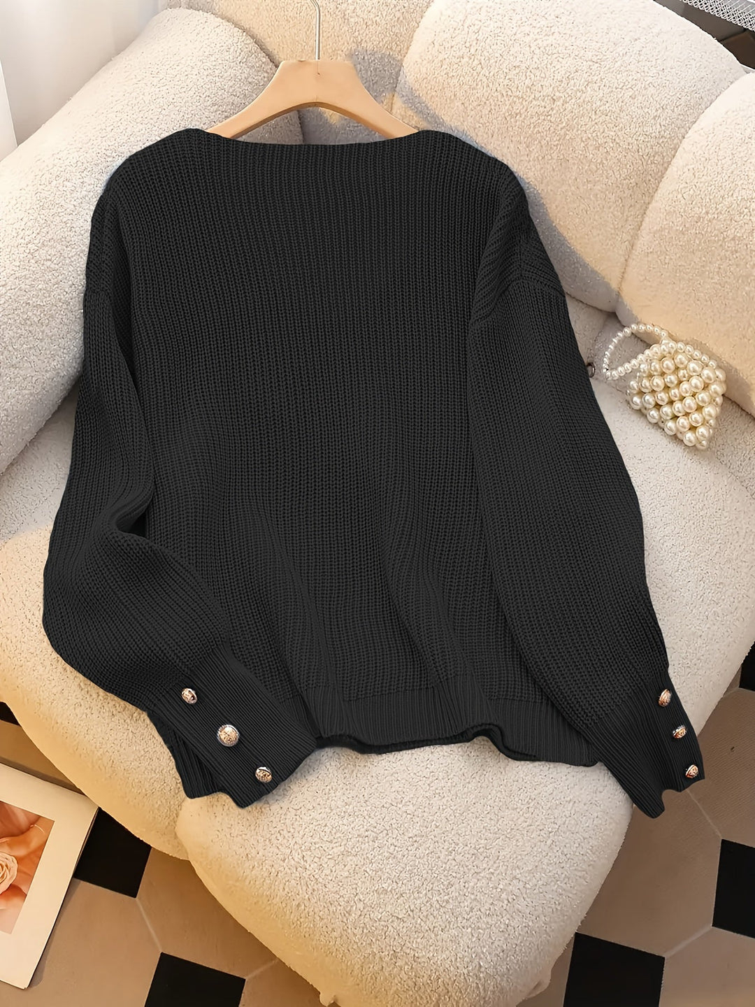 Nubia Rosa | Sweater de punto acanalado con escote V