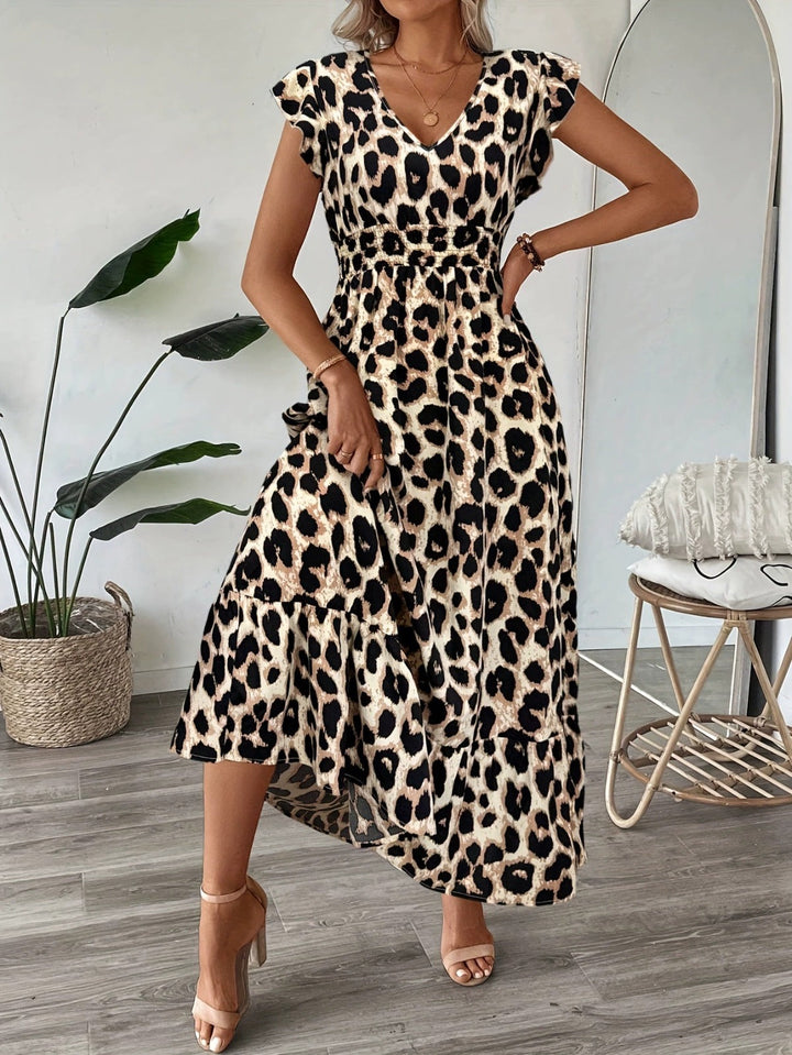 Gemita | Vestido largo con escote en V y estampado ornamental