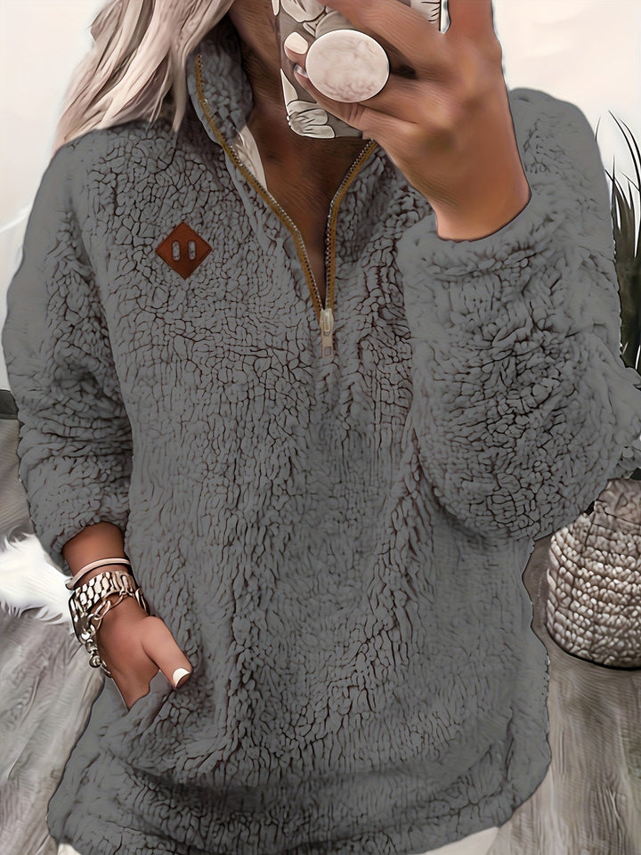 Tiare | Pullover peludo con media cremallera
