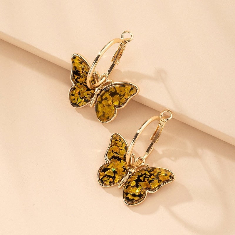 Natalia Paz | Aros de argolla con mariposa multicolor