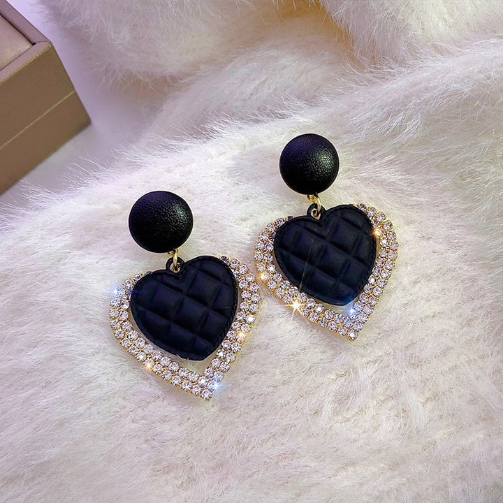 Rosamel | Aros corazón negro y dorado