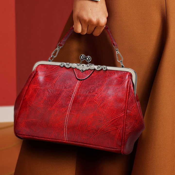 Delfina | Cartera vintage con cierre de beso