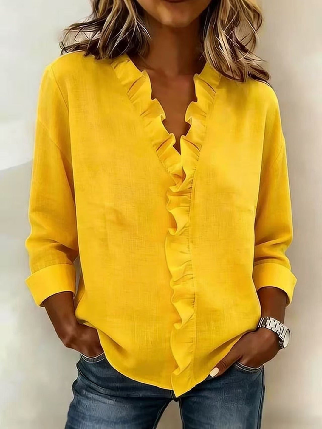 Ana Belén | Blusa elegante escote en V con vuelos