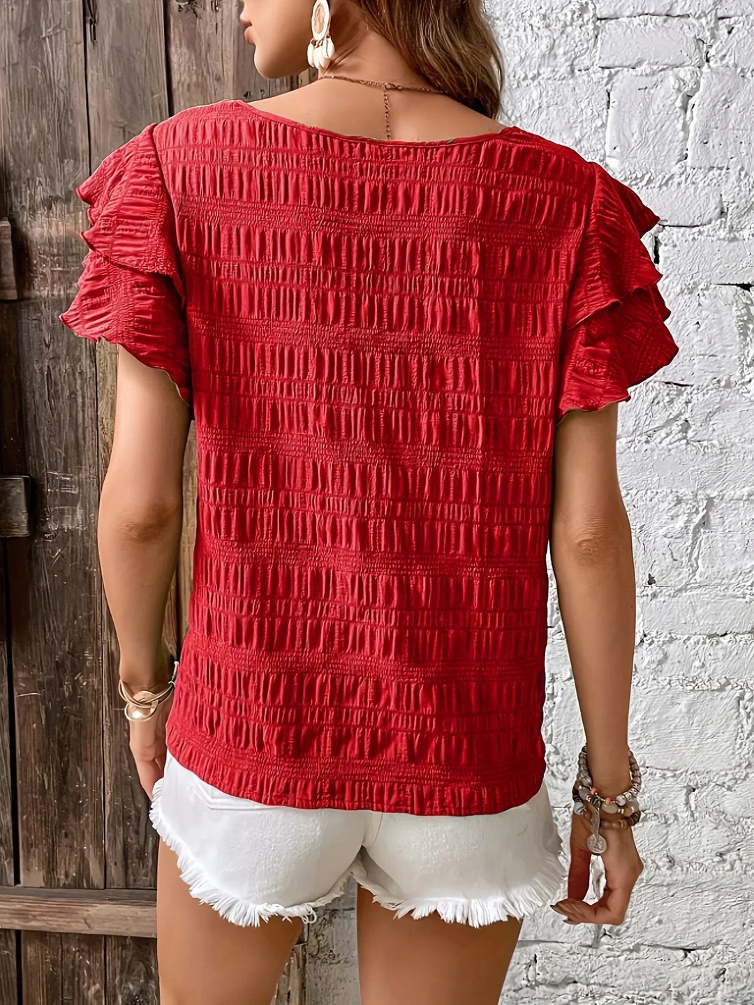 Vanessa | Blusa texturada con mangas volantes