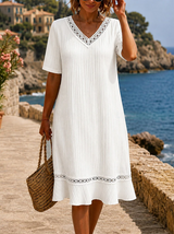 Lidia | Vestido midi bordado cuello V