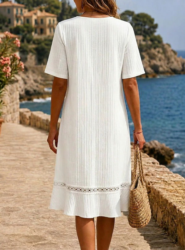 Lidia | Vestido midi bordado cuello V