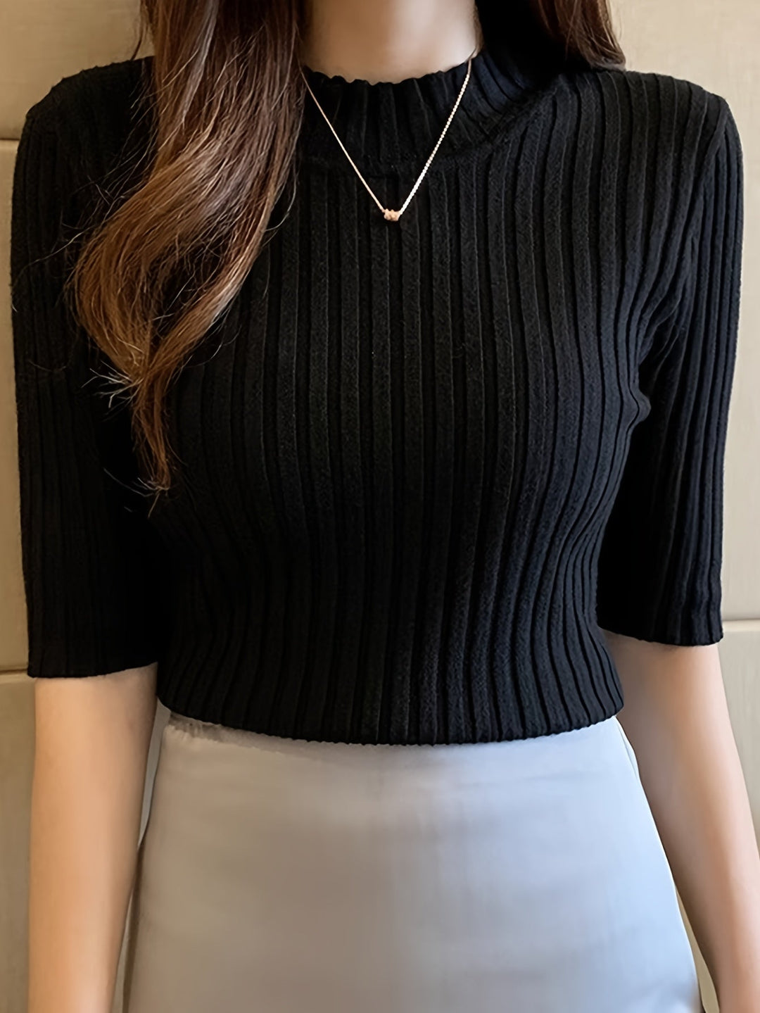 Nubia | Top acanalado cuello alto