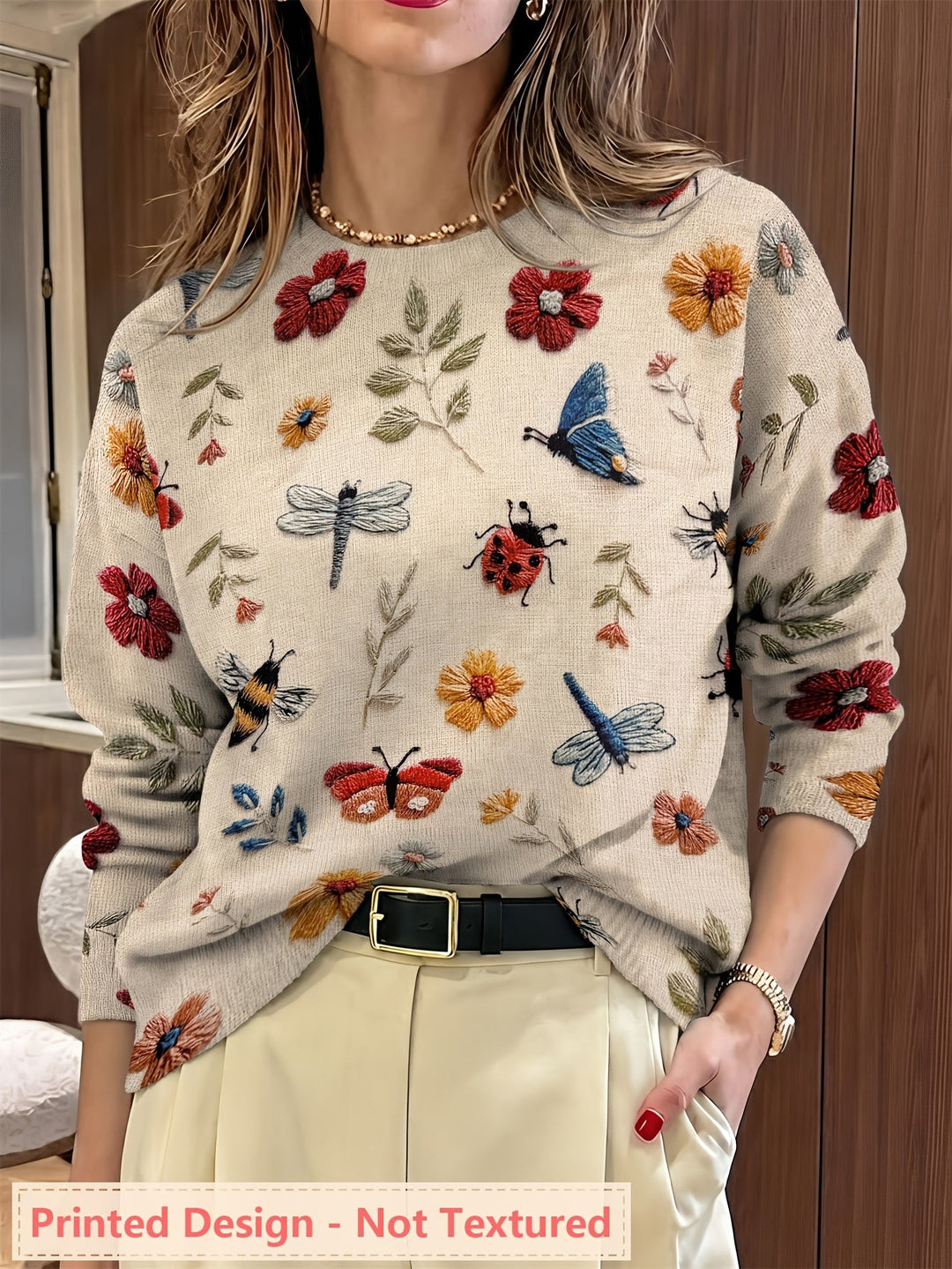 Claudia Andrea | Sweater con estampado botánico cuello redondo