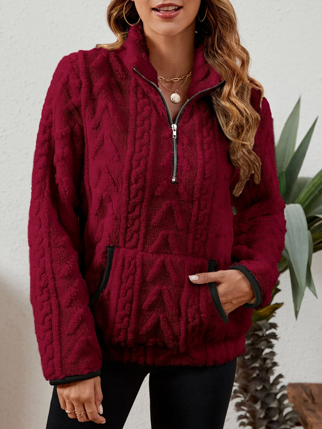 Manuela | Pullover texturado con media cremallera