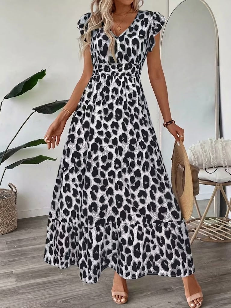 Gemita | Vestido largo con escote en V y estampado ornamental