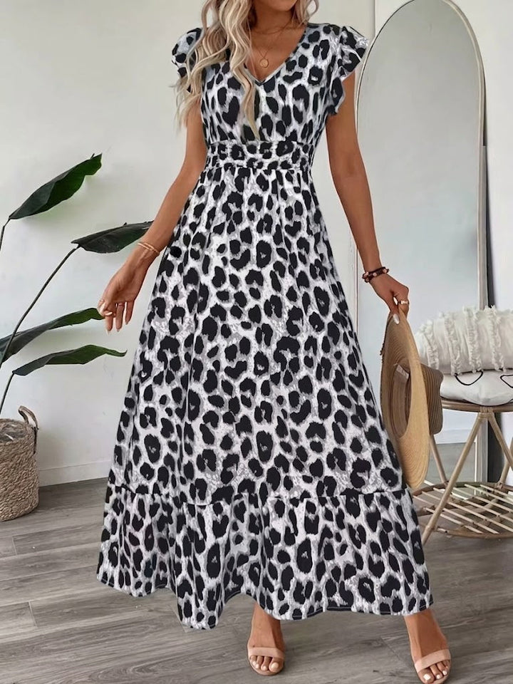 Gemita | Vestido largo con escote en V y estampado ornamental