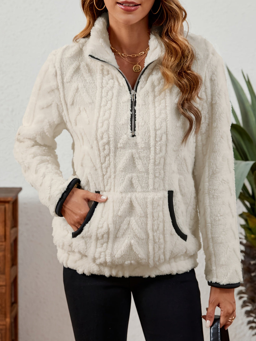 Manuela | Pullover texturado con media cremallera